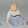 Schuler Auktionen AG - Figur: Sitzendes Baby, Royal Copenhagen, 20.Jh. 
