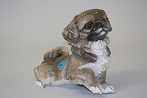 Schuler Auktionen AG - Tierfigur: Sitzender Japan-Chin, Rosenthal, Bahnhof-Selb, um 1921/22