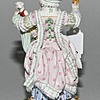 Schuler Auktionen AG - Mädchen mit Puppe, Meissen