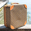 Schuler Auktionen AG - Louis Vuitton, kleiner Reisekoffer
