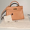 Schuler Auktionen AG - Hermès, Handtasche "Kelly retourné" 32 cm