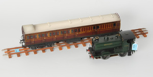 Schuler Auktionen AG - Douglas, Dampflokomotive und Personenwagen