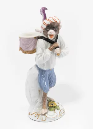 Schuler Auktionen AG - Meissen, Affe als Paukenträger