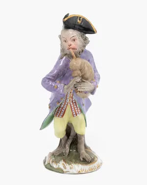 Schuler Auktionen AG - Meissen, Affe als Dudelsackpfeifer