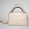 Schuler Auktionen AG - Louis Vuitton, Handtasche "Capucines"