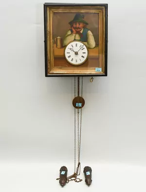 Schuler Auktionen AG - Augenwender-Wanduhr