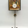 Schuler Auktionen AG - Augenwender-Wanduhr