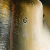 Schuler Auktionen AG - Wassermann-Figur mit Trinkschale
