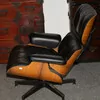 Schuler Auktionen AG - Charles & Ray Eames, Lounge Chair "670" mit Ottoman "671"