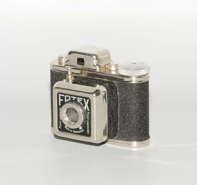 Schuler Auktionen AG - Ernst Hofer, Rollfilmkamera "FOTEX 4x4 cm"