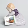 Schuler Auktionen AG - Meissen, Figur "Kind mit Bilderbuch, gross"