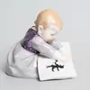 Schuler Auktionen AG - Meissen, Figur "Kind mit Bilderbuch, gross"