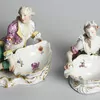 Schuler Auktionen AG - Meissen, 1 Paar Figuren mit Gewürzschalen 