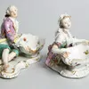 Schuler Auktionen AG - Meissen, 1 Paar Figuren mit Gewürzschalen 