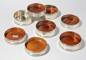Schuler Auktionen AG - Lot: 8 Gläser-/Flaschenuntersetzer