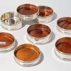 Schuler Auktionen AG - Lot: 8 Gläser-/Flaschenuntersetzer