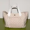 Schuler Auktionen AG - Louis Vuitton, Strandtasche "Ipanema"