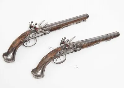Schuler Auktionen AG - Doppelsteinschloss-Pistolenpaar