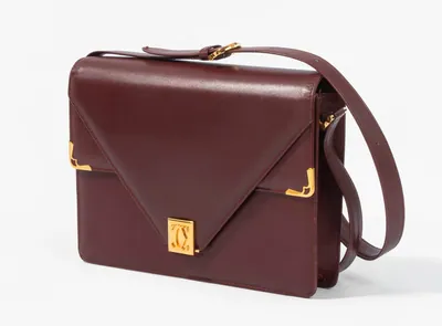 Schuler Auktionen AG - Cartier, Schultertasche "Must de Cartier"
