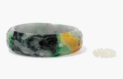 Schuler Auktionen AG - Lot: 2 Jade-Schmuckstücke