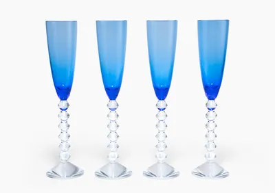 Schuler Auktionen AG - Baccarat, 4 Champagnergläser "Vega Couleur"