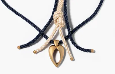 Schuler Auktionen AG - Piaget Anhänger mit zwei Kordeln