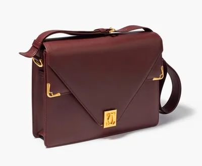 Schuler Auktionen AG - Cartier, Schultertasche "Must de Cartier"