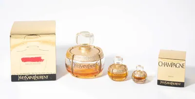 Schuler Auktionen AG - Yves Saint Laurent, 3 Parfumflakons "Champagne"