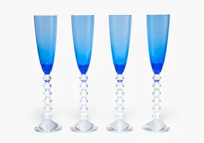 Schuler Auktionen AG - Baccarat, 4 Champagnergläser "Vega Couleur"