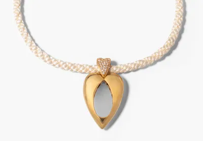 Schuler Auktionen AG - Piaget Anhänger mit Kordel