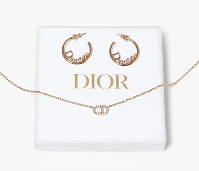 Schuler Auktionen AG - Dior, 1 Paar Ohrringe und Kette