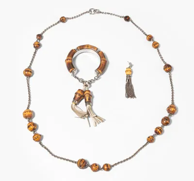 Schuler Auktionen AG - Gucci, Collier und Armreif "Bamboo"