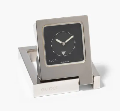 Schuler Auktionen AG - Gucci, Reisetischuhr