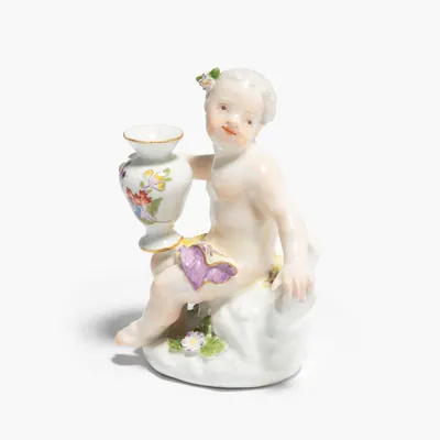 Schuler Auktionen AG - Meissen, Amorette mit Vase
