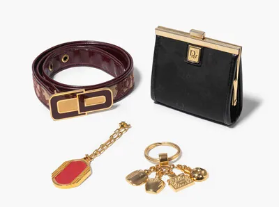 Schuler Auktionen AG - Christian Dior, Gürtel, Geldbeutel und 2 Schlüsselanhänger