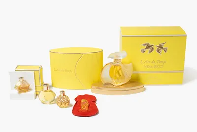 Schuler Auktionen AG - Lalique für Nina Ricci, 4 Flakons "L’Air du Temps" und Brosche "Deci Delà"