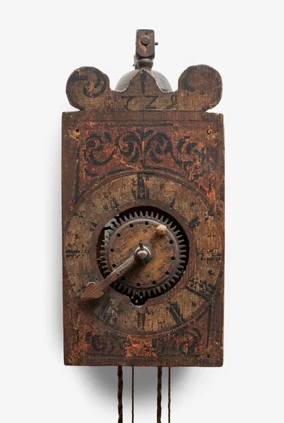 Schuler Auktionen AG - Holzräderuhr