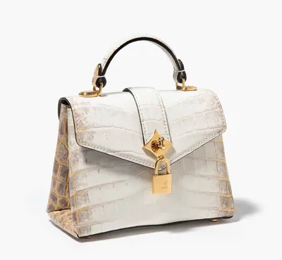 Schuler Auktionen AG - Louis Vuitton, seltene Handtasche "Rose Des Vents Mini"