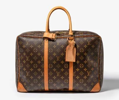Schuler Auktionen AG - Louis Vuitton, Reisetasche "Sirius 45"