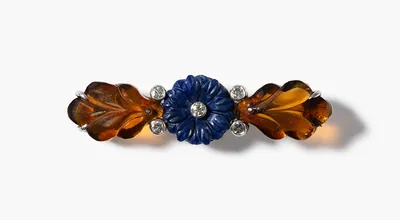 Schuler Auktionen AG - Cartier Art Déco Lapislazuli-Citrin-Diamant-Stabbrosche